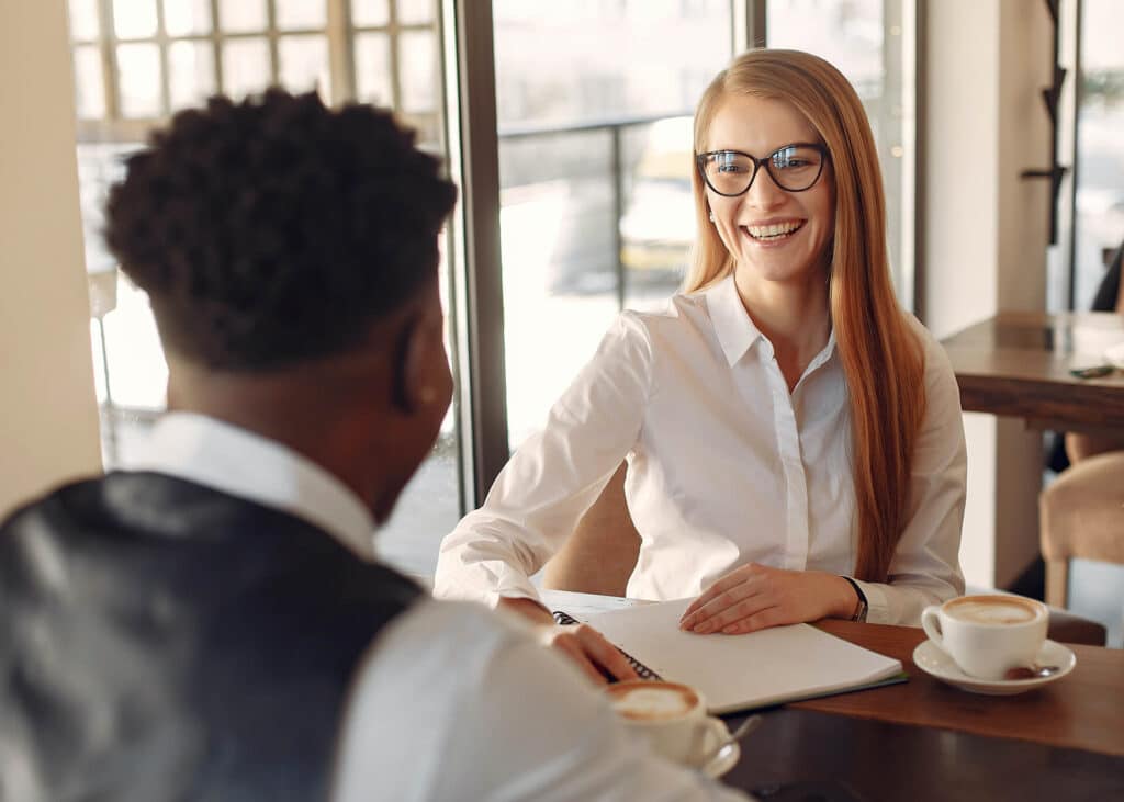 22 Signs a Female Coworker Likes You » GoDates