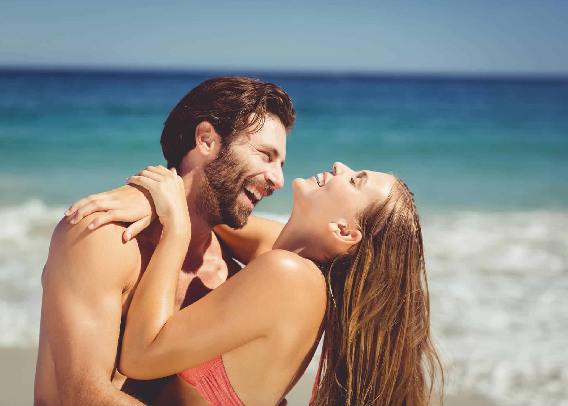 couple in love having fun on the beach