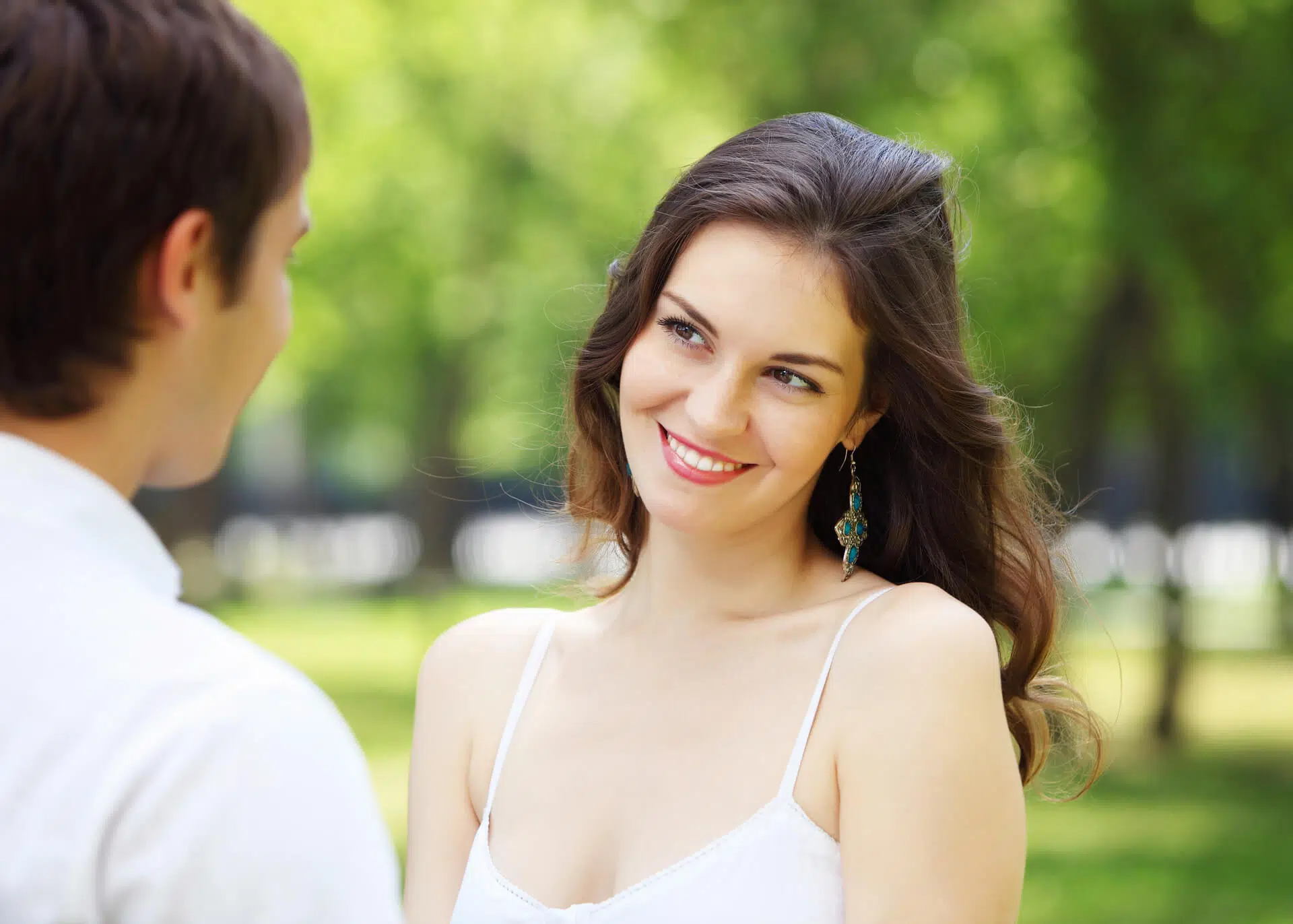 couple in love looking at each other in the park