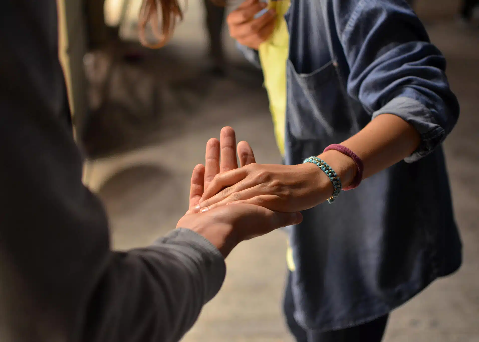 man holding womans hand