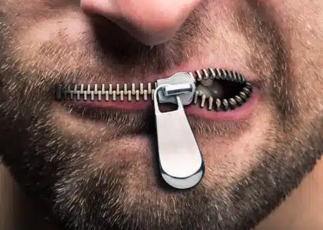 man with his mouth zipped
